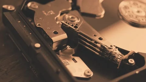 Technical detail of an open hard disk for repair Video stock 136402726