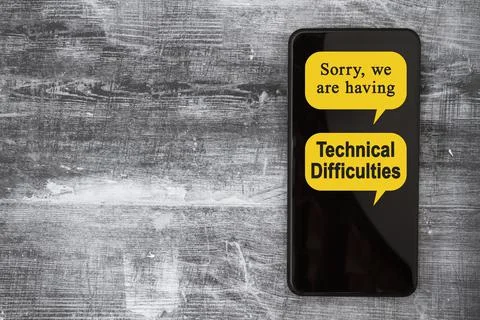 Technical Difficulties message on a black mobile phone Stock Photos