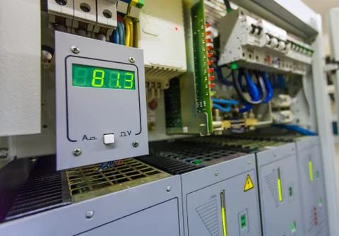 Technical display on control panel with electric devices and light screen  wit Stock Photos