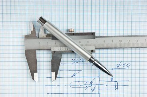 Technical drawing and callipers with  pen 스톡 사진