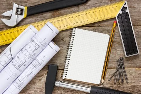 Technical drawing and tools with blank notebook Stock Photos