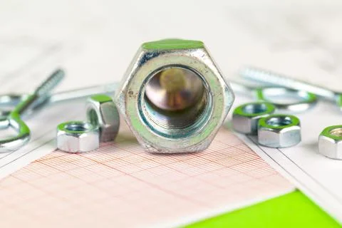 Technical drawings of bolt and nut. Engineering, technology and metalworking Stock Photos