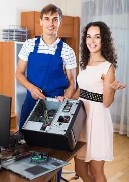 Technical engineer upgrading hardware of client computer Stock Photos