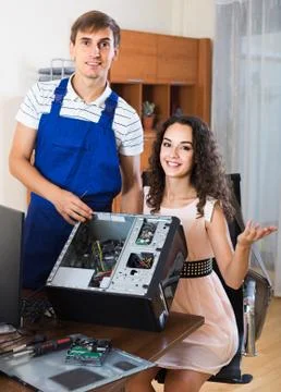 Technical engineer upgrading hardware of client computer Stock Photos