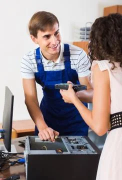 Technical engineer upgrading hardware of client computer Stock Photos
