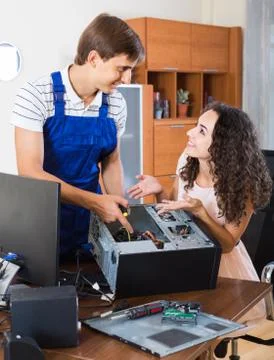 Technical engineer upgrading hardware of client computer Stock Photos