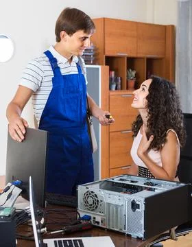 Technical engineer upgrading hardware of client computer Stock Photos