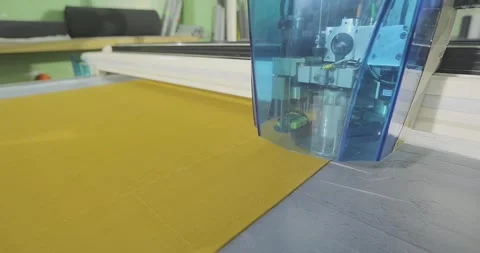 Technical Fabric Processing on CNC Plotter. Industrial CNC Cutter Processing Stockbeeldmateriaal 337192946