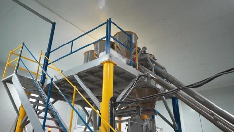Technical ground with pipes to tanks and electric cables in workshop Stock Footage 304427391