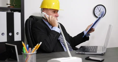 Technical Manager Computer Work Clipboard Reading Phone Architect Discussion Stock-Footage 50947374