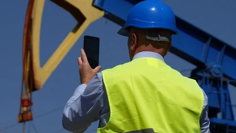 Technical Manager Oil Pump Inspector Take Photos and Video Images Using Mobile Stock-Footage 74987440