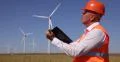 Technical Manager Report Writing Agenda Busy Engineer Man Inspect Wind Turbines 4k or 4k+ Resolution