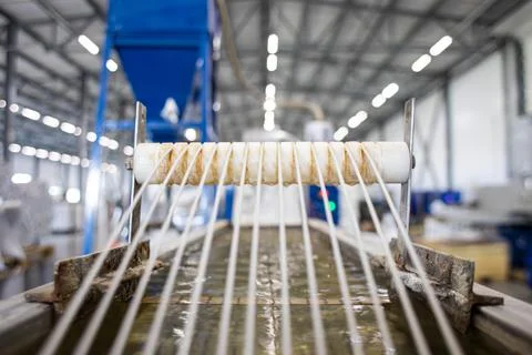 The technical process for the production of polypropylene yarns for further use Stock Photos