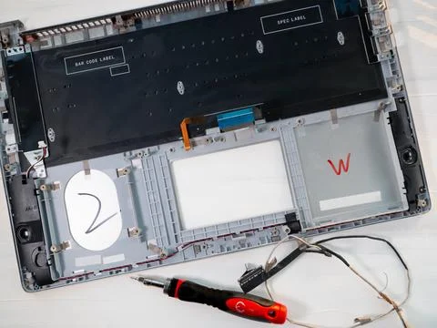 Technical repairing broken notepad  concept. Stock Photos