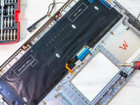 Technical repairing broken notepad  concept. Stock Photos
