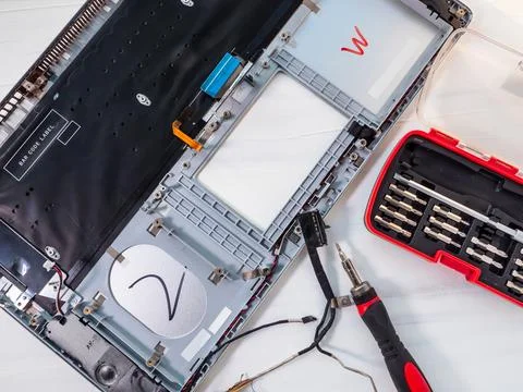 Technical repairing broken notepad  concept. Stock Photos