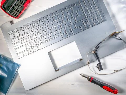 Technical repairing broken notepad  concept. Stock Photos