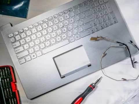 Technical repairing broken notepad  concept. Stock Photos