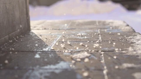 Technical salt reagent on the steps in winter close up,slow mo Stock Footage 100768252