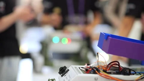 Technical setup with exposed wiring and components in foreground Stock Footage 345407189
