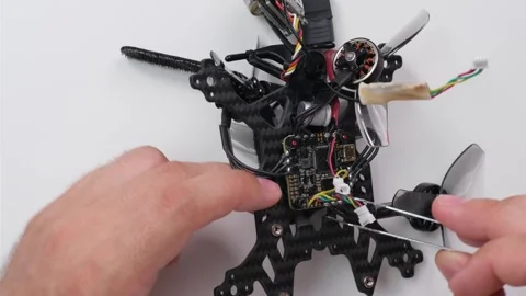 Technical Specialist assembly drone fpv quadrocopter after repair Stock Footage 244334722