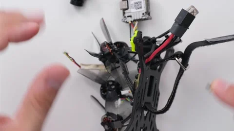 Technical Specialist assembly drone fpv quadrocopter after repair Stock Footage 244334811