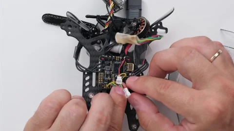 Technical Specialist assembly drone fpv quadrocopter Stock Footage 244334906