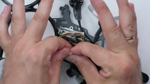 Technical Specialist assembly drone fpv quadrocopter after repair Stock Footage 244334909