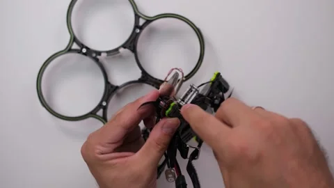 Technical Specialist assembly drone fpv quadrocopter Stock Footage 244335575