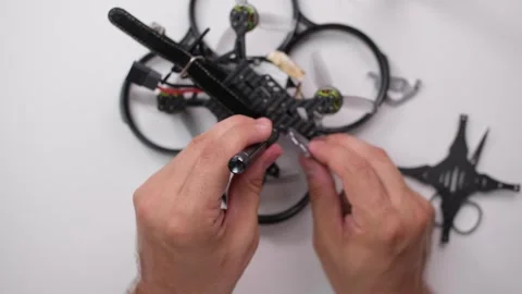 Technical Specialist assembly drone fpv quadrocopter Stock Footage 244335848