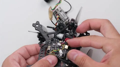 Technical Specialist assembly repair drone fpv quadrocopter Stock Footage 244334684