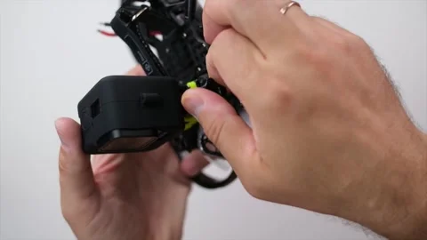 Technical Specialist mount camera to drone fpv quadrocopter Stock Footage 244341317