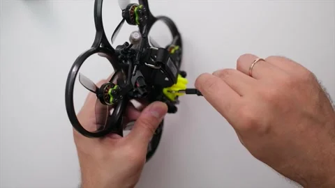 Technical Specialist take apart to drone fpv quadrocopter and assembly cusomize Stock Footage 244341326