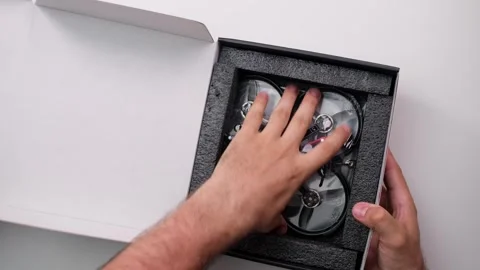 Technical Specialist unbox and take apart to repair drone fpv quadrocopter Stock Footage 244330832