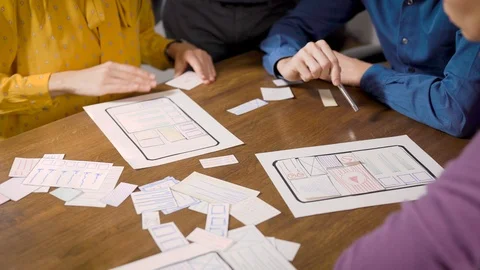 Technical specialists are developing and discussing new algorithms, viewing Stock Footage 120406904