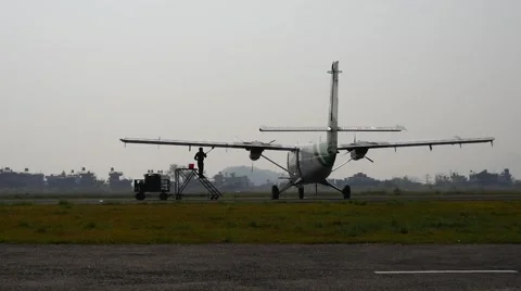 Technical staff washes plane Stock Footage 61771571