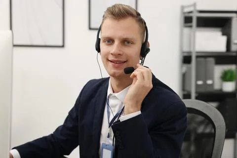 Technical support call center. Portrait of smiling operator in office Stock Photos