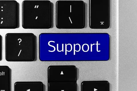 Technical support. Computer keyboard with word on blue button, closeup Stockfoto's