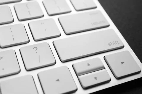 Technical support concept. Modern keyboard on black background, closeup 写真素材