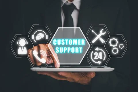 Technical support customer service concept, Businessman using digital table.. Stock Photos