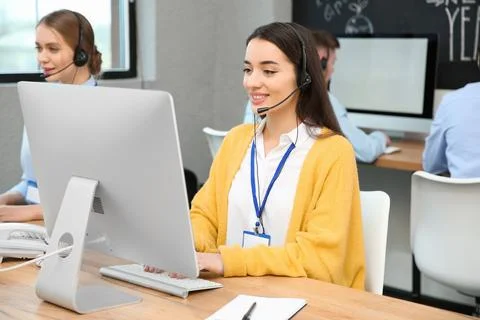 Technical support operator working with colleagues in office Stock Photos