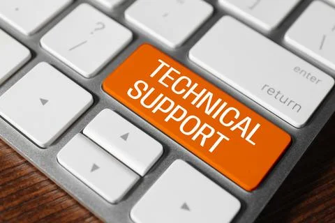 Technical Support orange button on computer keyboard, closeup 库存照片