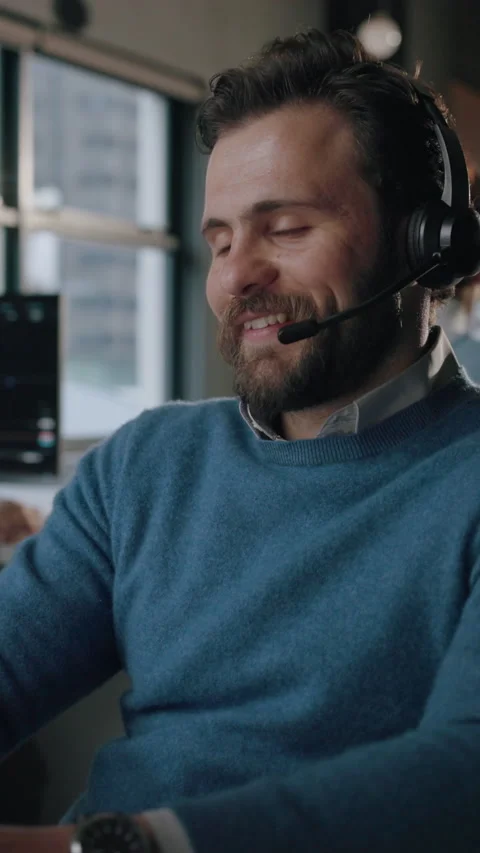 Technical support, smile and man in call center, talking and online help for Stock Footage 338055133