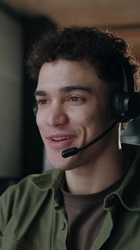 Technical support, smile and man in call center, help and talking online for Stock Footage 338091912