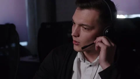 Technical Support Specialist With Headsets Working On Computer In Call Center. Stock-Footage 194410062