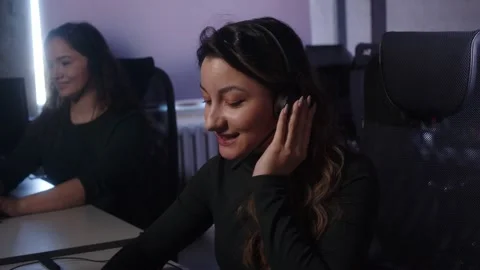 Technical Support Specialist Working In Call Center Answers Incoming Calls. Stock-Footage 194409716