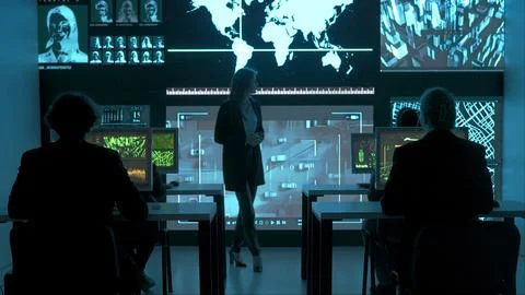 Technical support team in control room. IT specialists at the security office Stock Photos