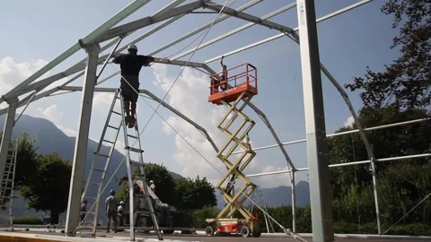 Technical work. Temporary structure on the lake shore. Aluminum construction Stock Footage 131471972