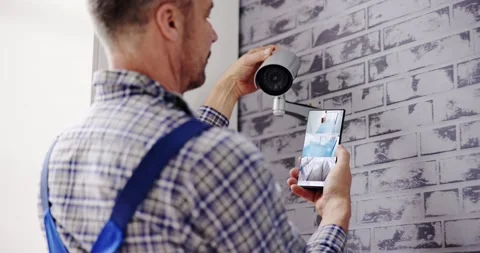 Technician Adjusting CCTV Stock Footage 236404349