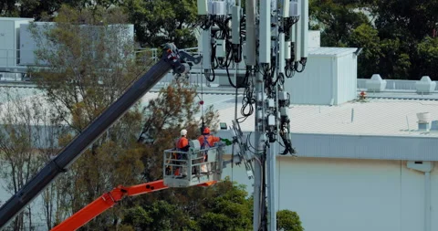 Technician and engineer upgrading Telecommunication Tower of 4G to 5G antenna. 스톡 동영상 236480273